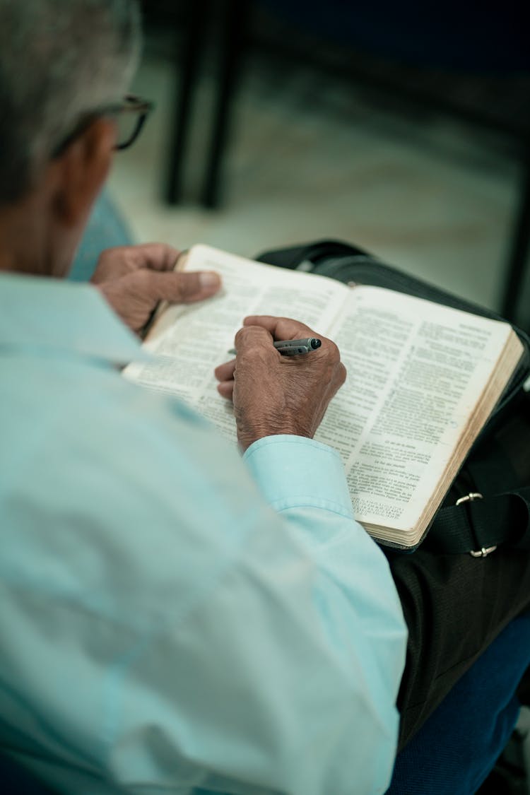 Elderly Man Reading Bible