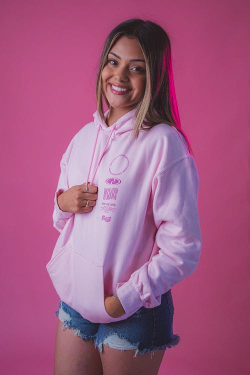 A Woman in a Pink Hoodie