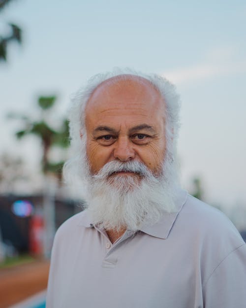 Portrait of a Bearded Senior Man Outdoors