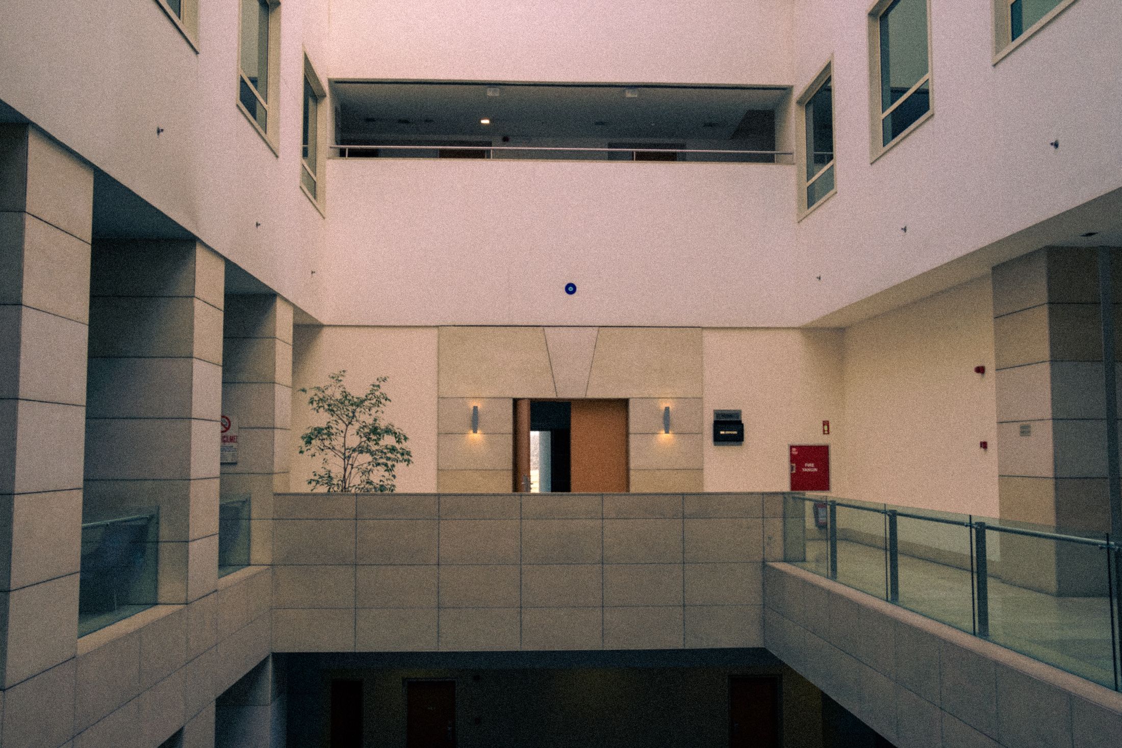 Context photograph: Light-filled atrium in a modern institutional building. Not a VIEWPIECE acquisition or analysis.