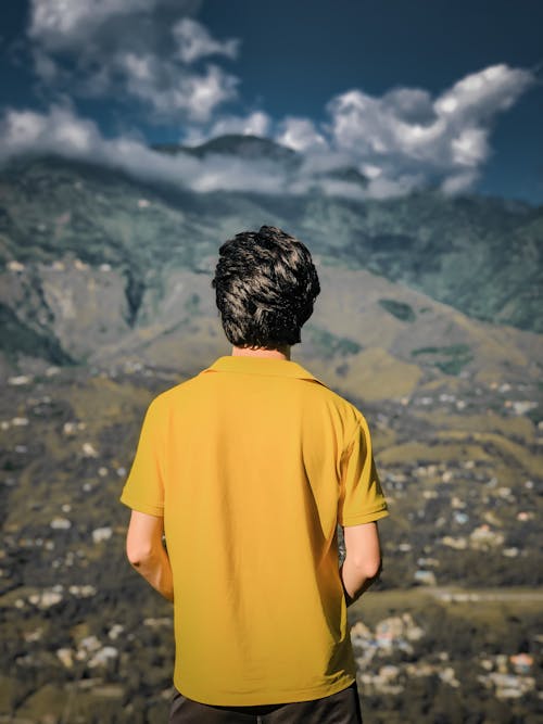 Back View of Man in Yellow T-shirt