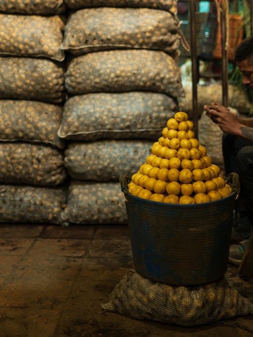 Man Selling Fruits at a Market 