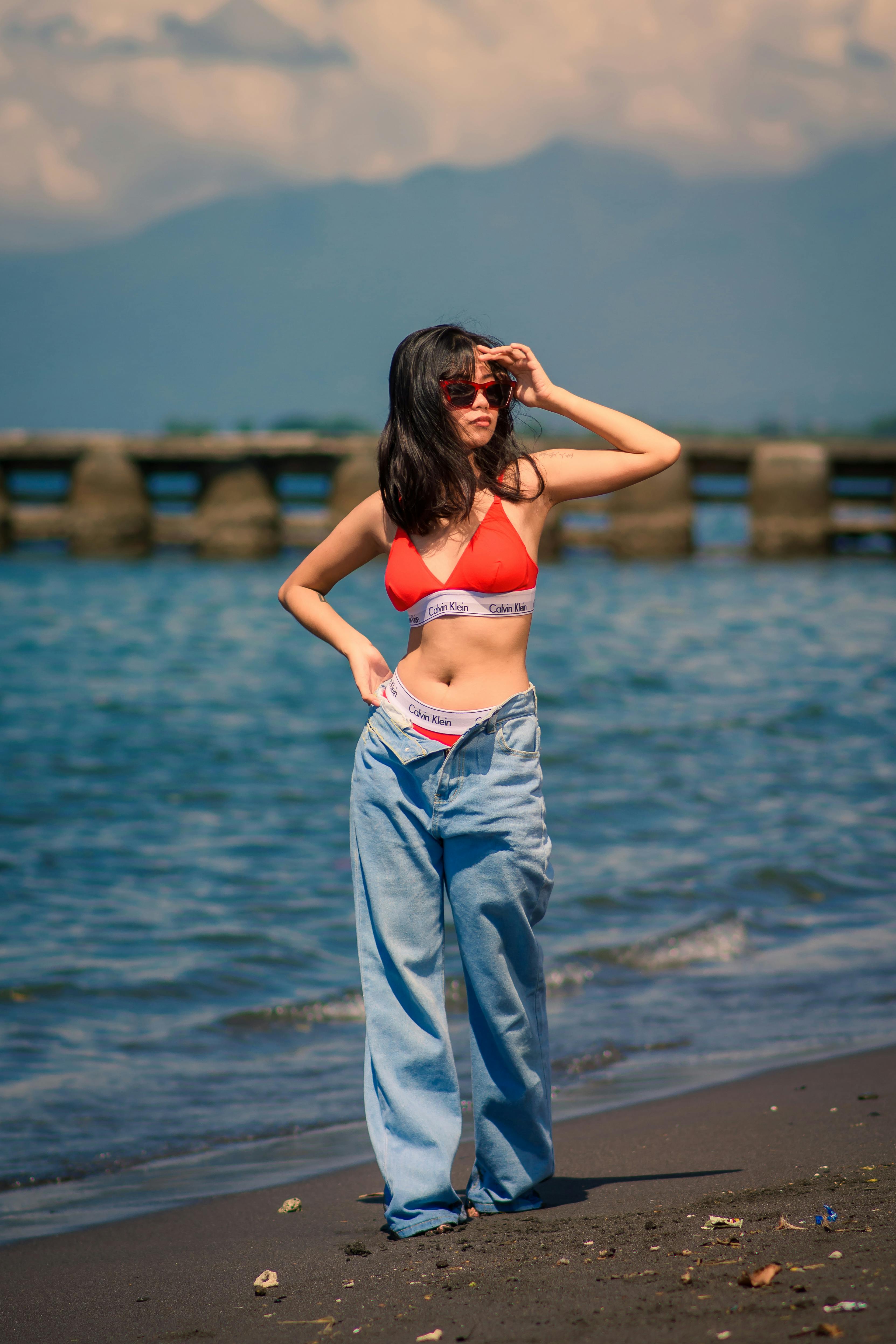 free photo of female model posing on a beach