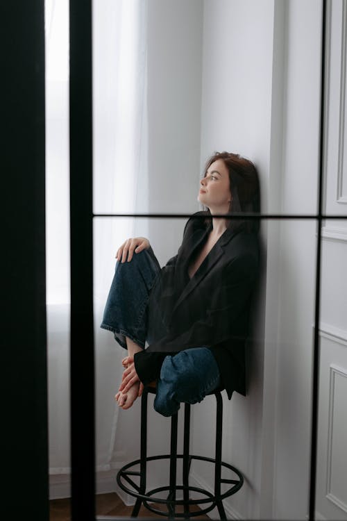 Free Barefoot Woman Sitting on Stool Stock Photo