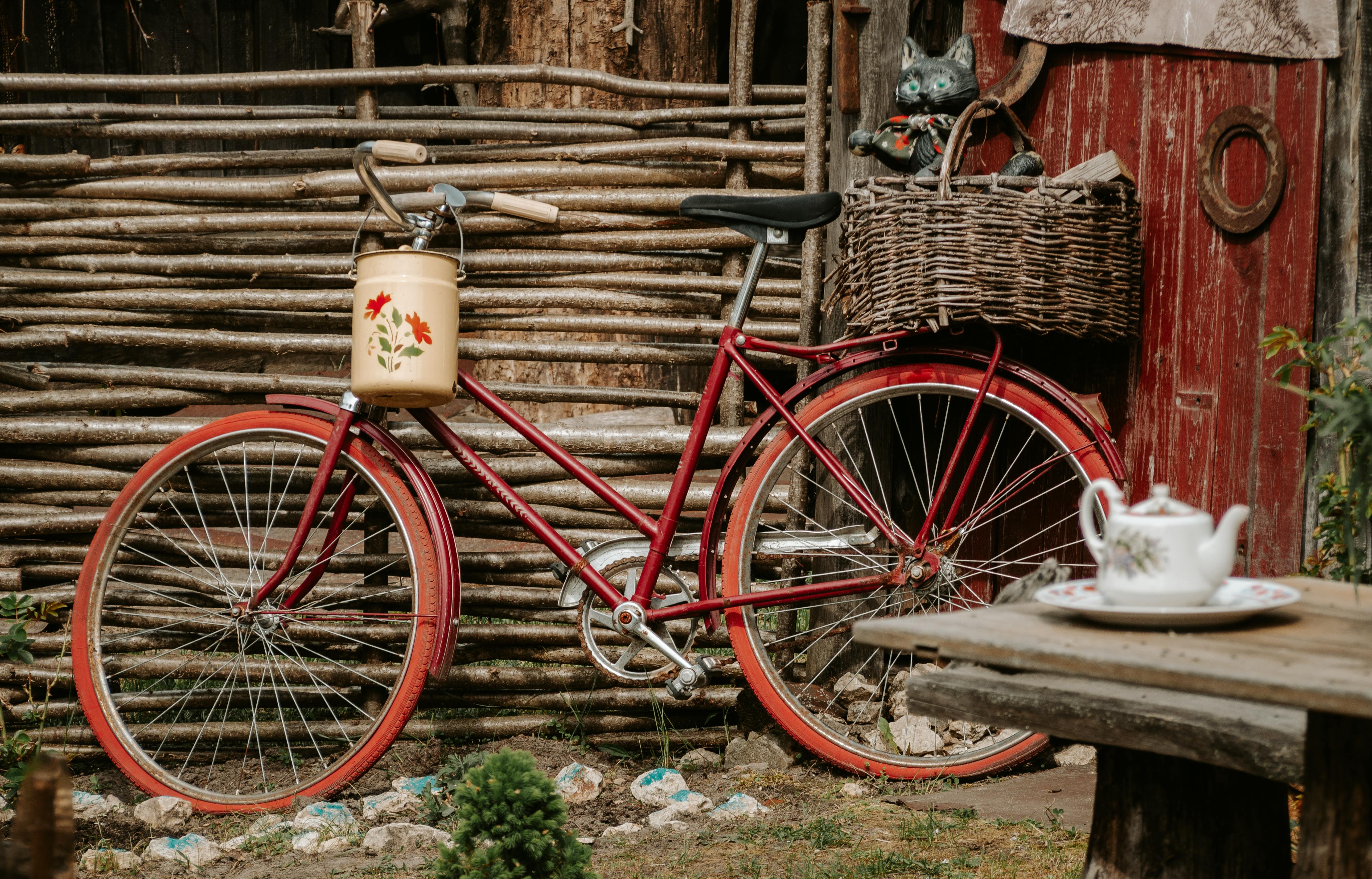 Red Bicycle with Willow Basket and Milk Churn on the Handlebars · Free