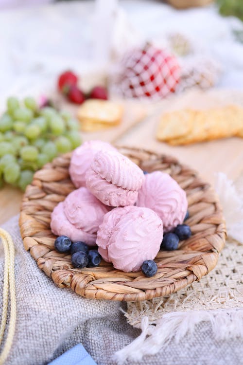 Small Pink Meringues in a Basket