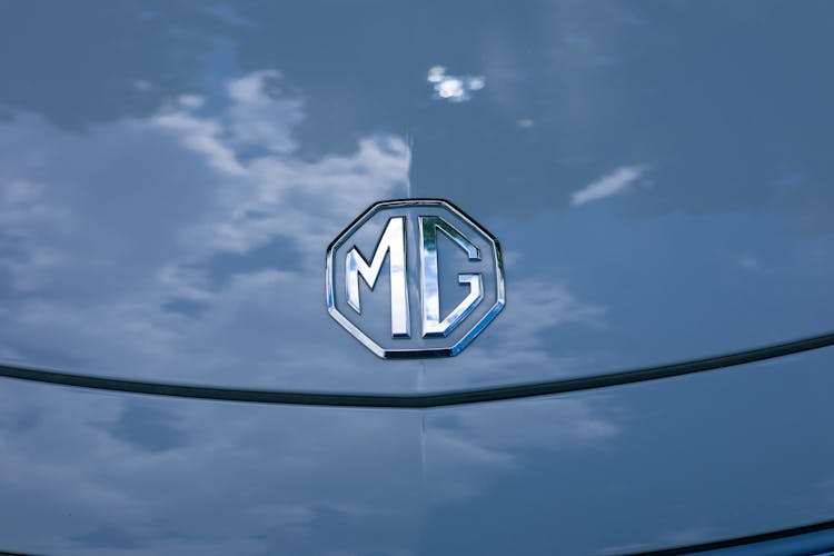 Logo Of A British Automotive Company On The Hood Of A Car