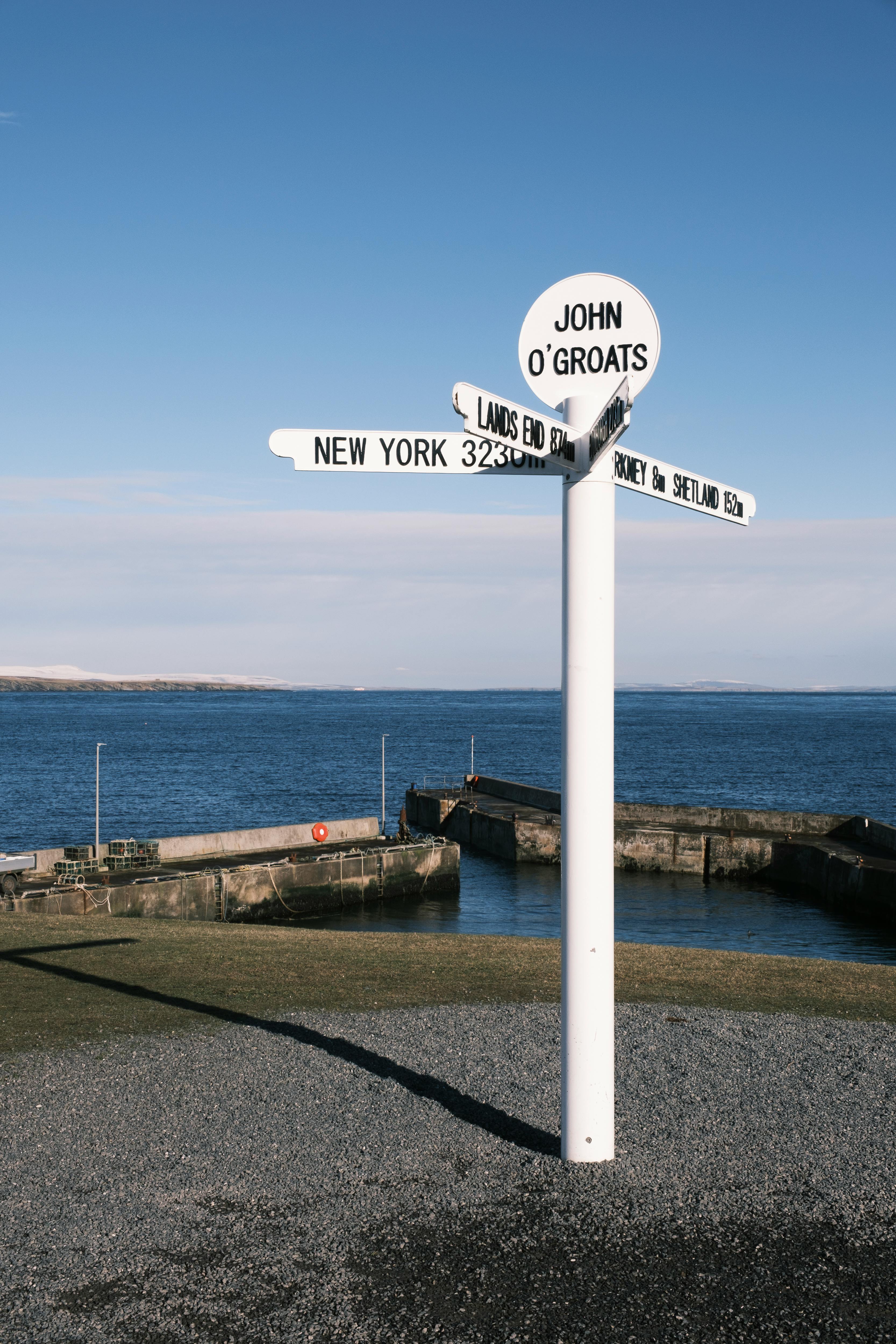 a distance sign at a port in john ogroats scotland