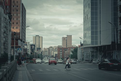 People on the Crosswalk in a Modern Downtown 
