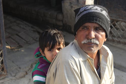 Elderly Man with Child