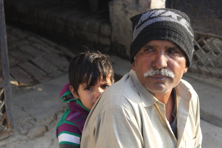 Elderly Man With Child