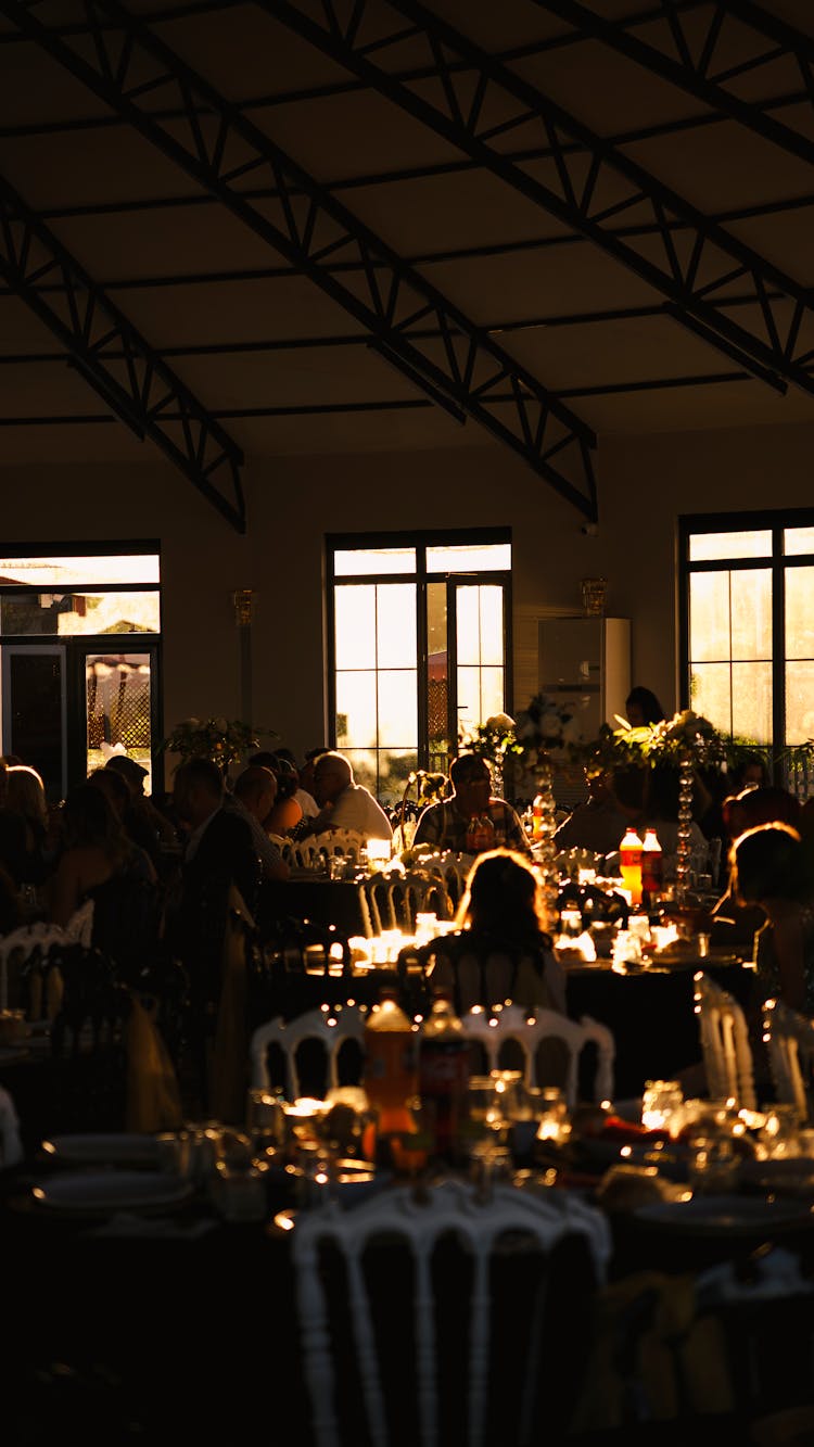 People In Restaurant At Sunset