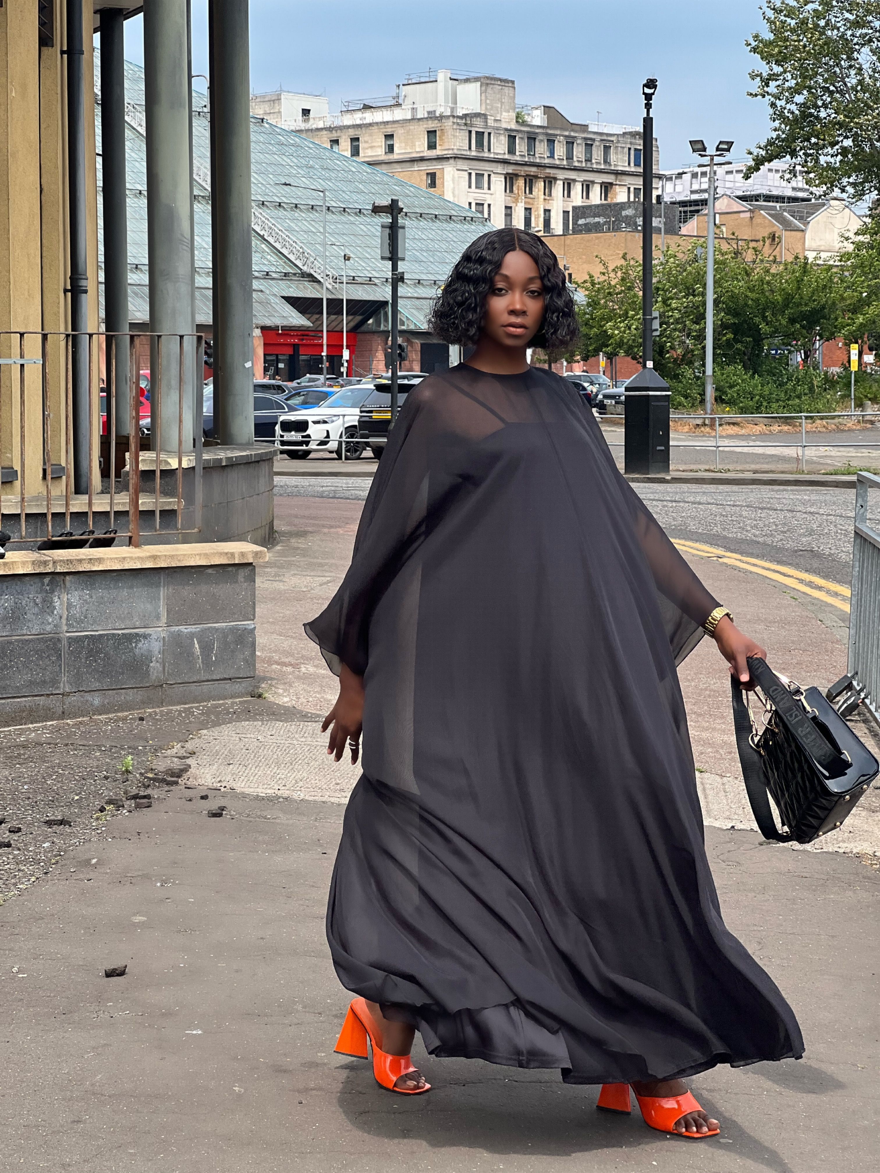 Woman in Black Dress and with Bag · Free Stock Photo