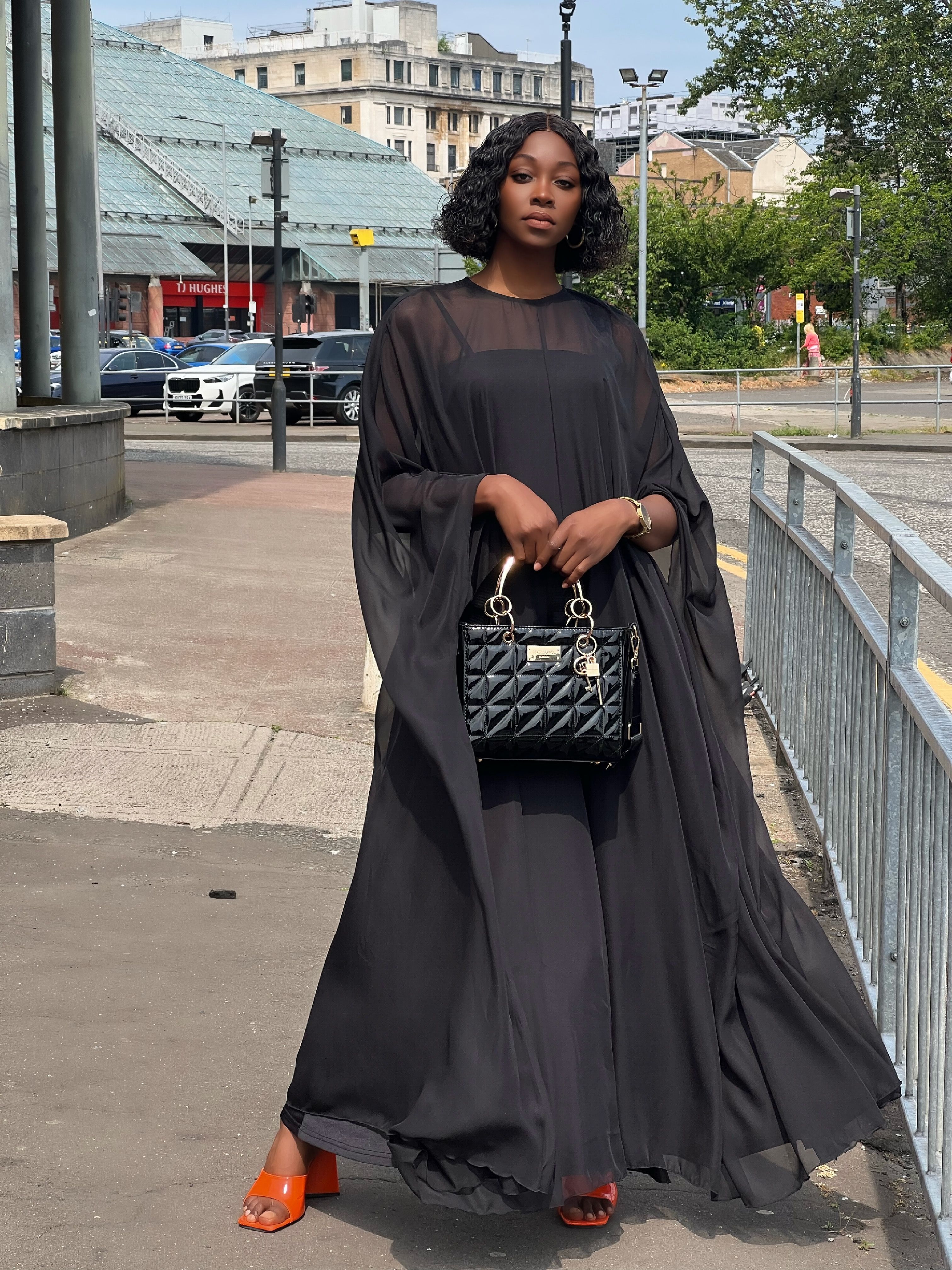 Woman in Black Dress and with Bag · Free Stock Photo