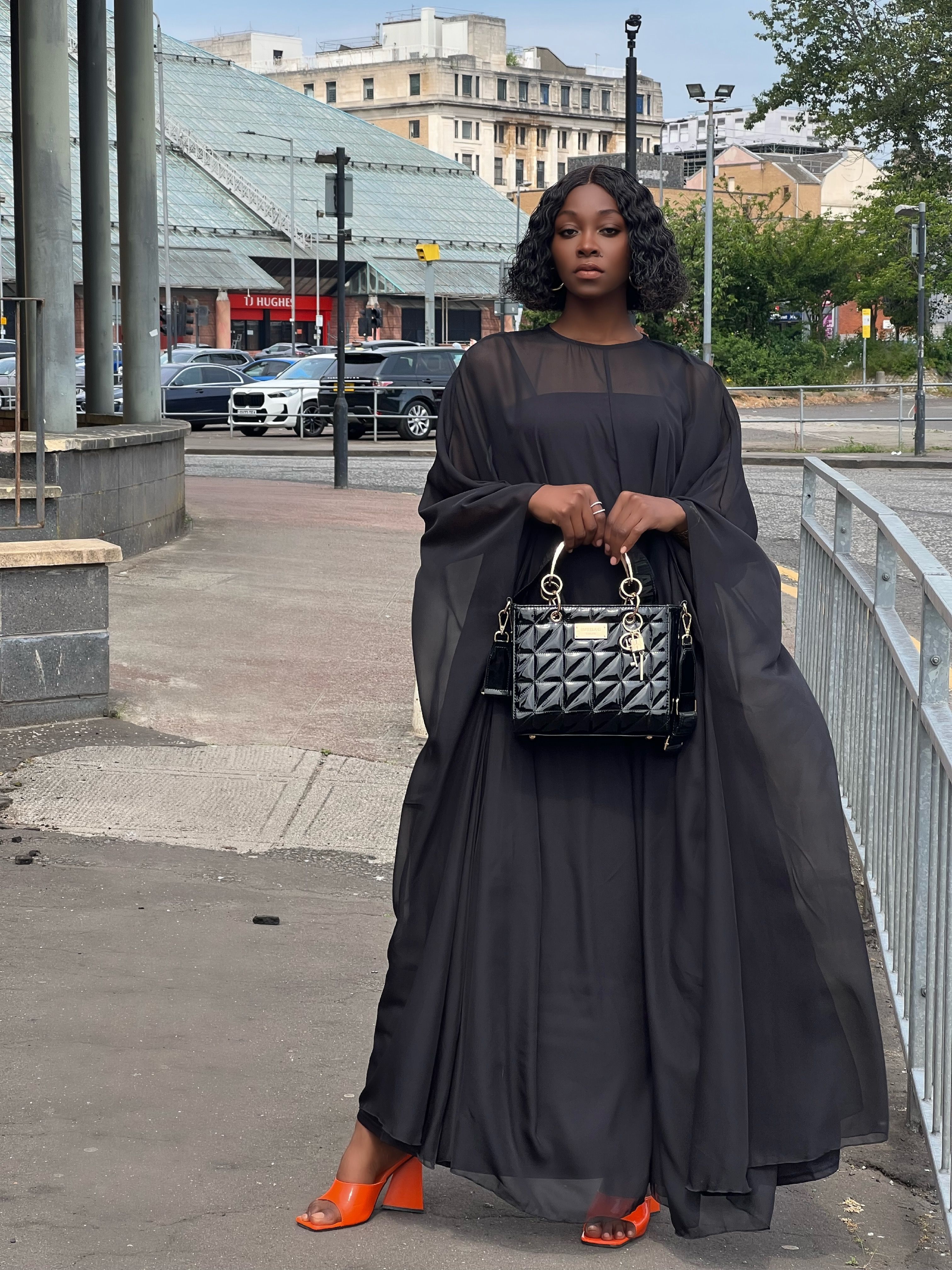 Woman in Black Dress and with Bag · Free Stock Photo