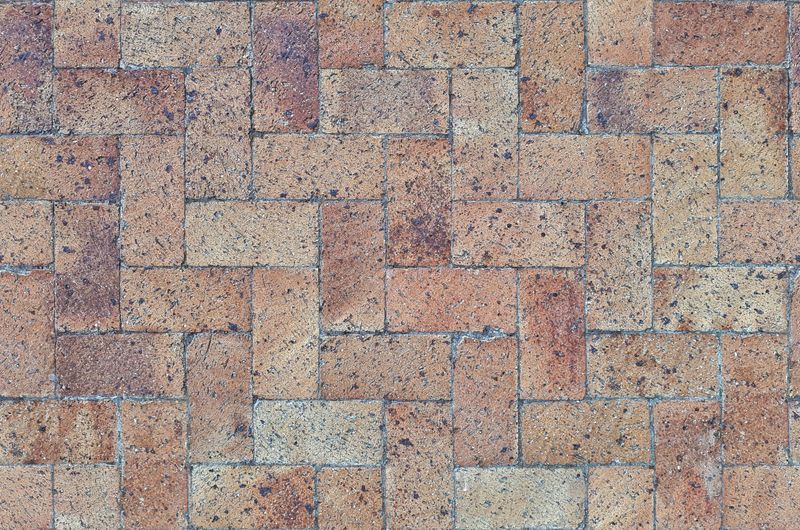 Terracotta herringbone paving