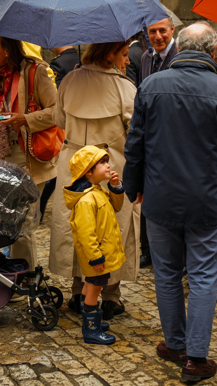 Child And People In Jackets