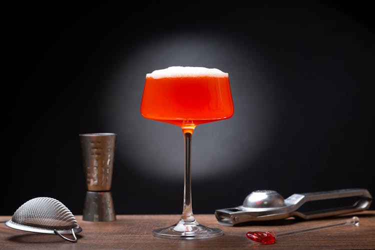 Amazing Red Cocktail With Foam On The Top