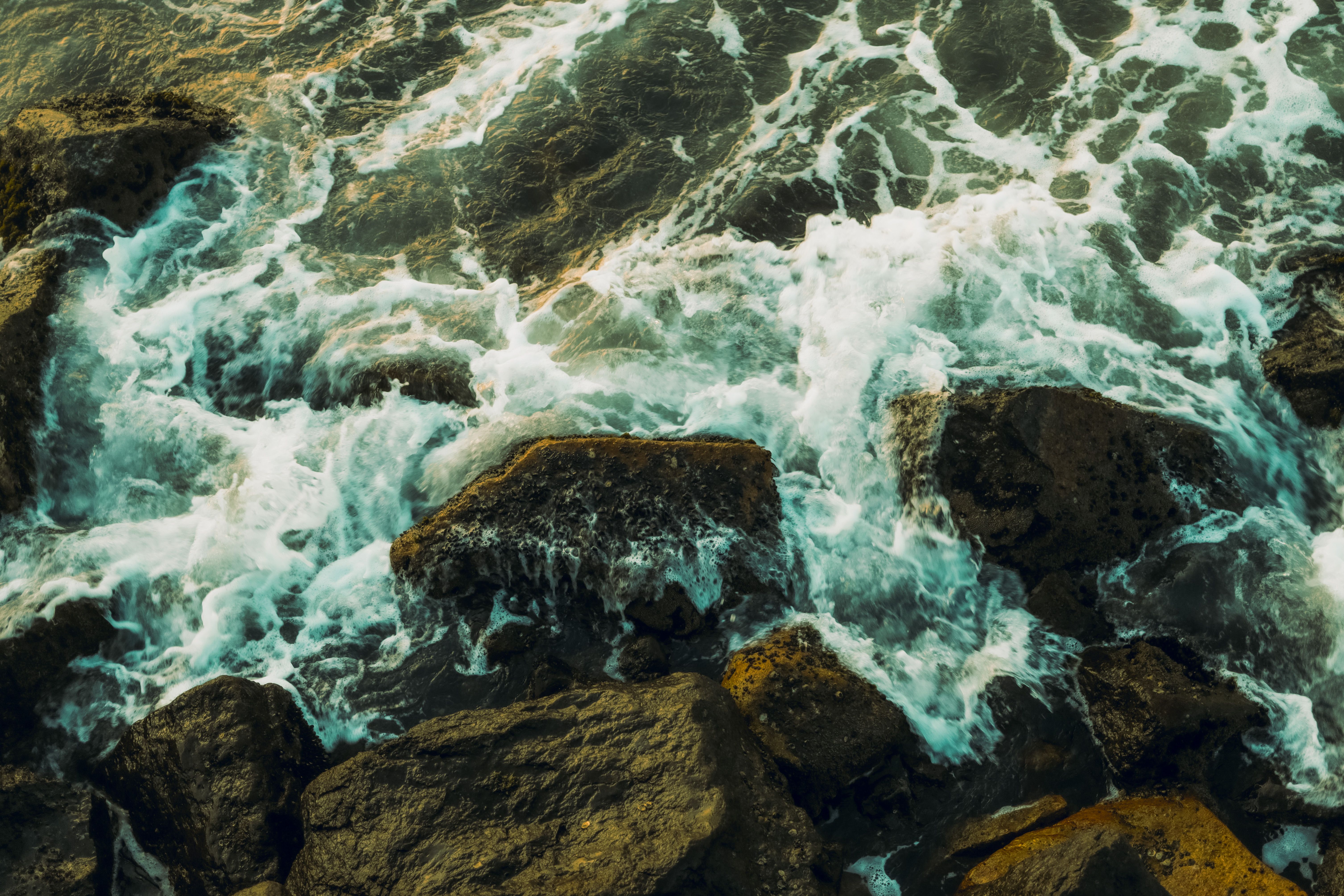 Waves Splashing on Rocks · Free Stock Photo