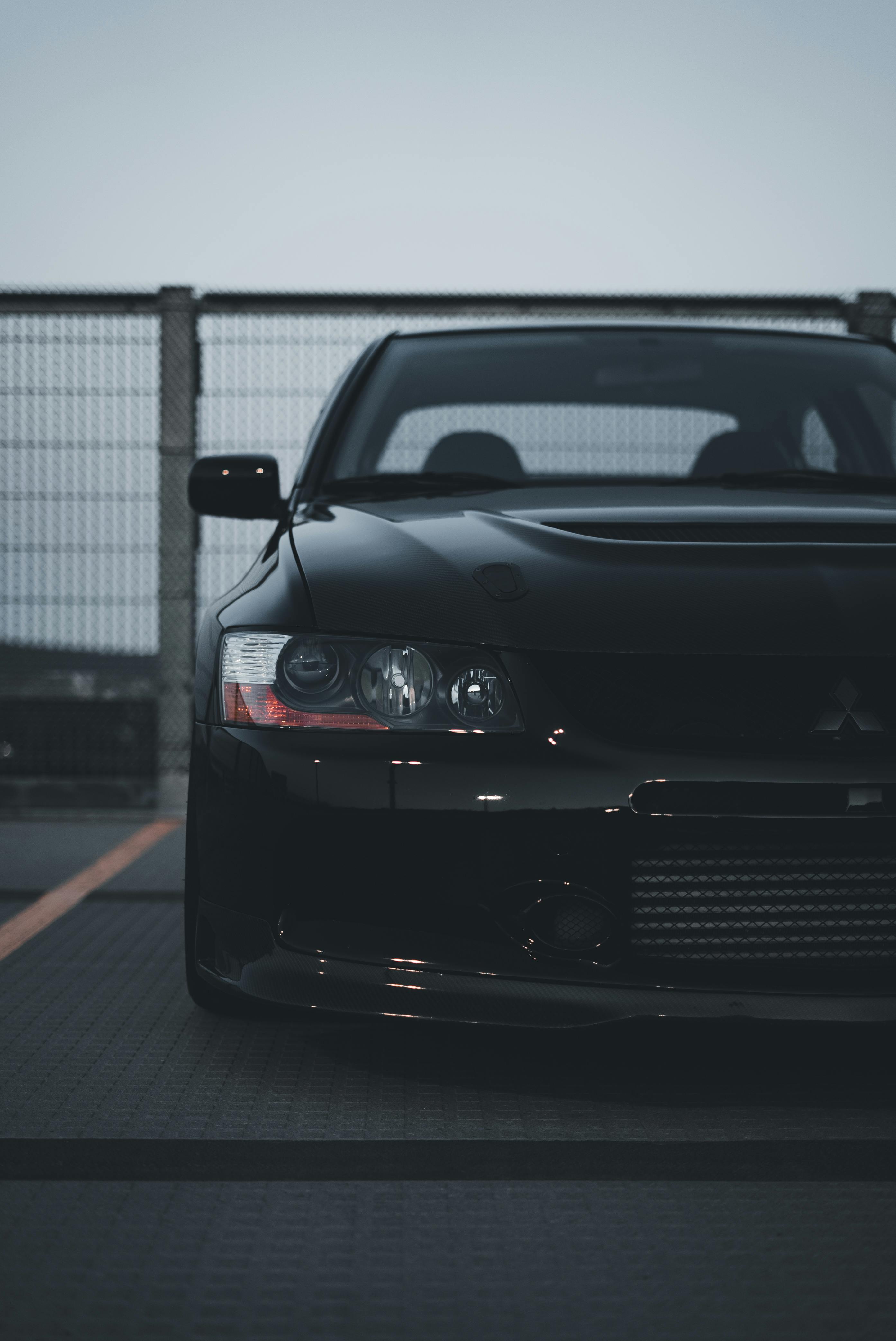 Blue Nissan Skyline R34 GTR at Night · Free Stock Photo