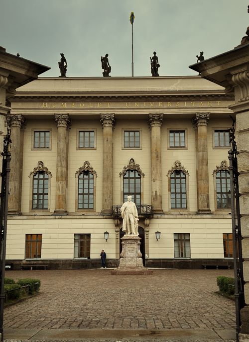 Free A classic view of Humboldt University featuring a prominent statue and architectural details in Berlin, Germany. Stock Photo