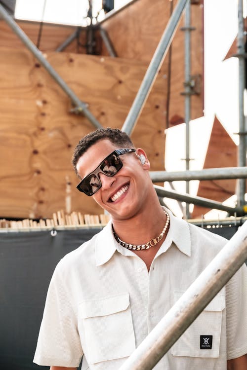 Smiling Man in Sunglasses and Shirt