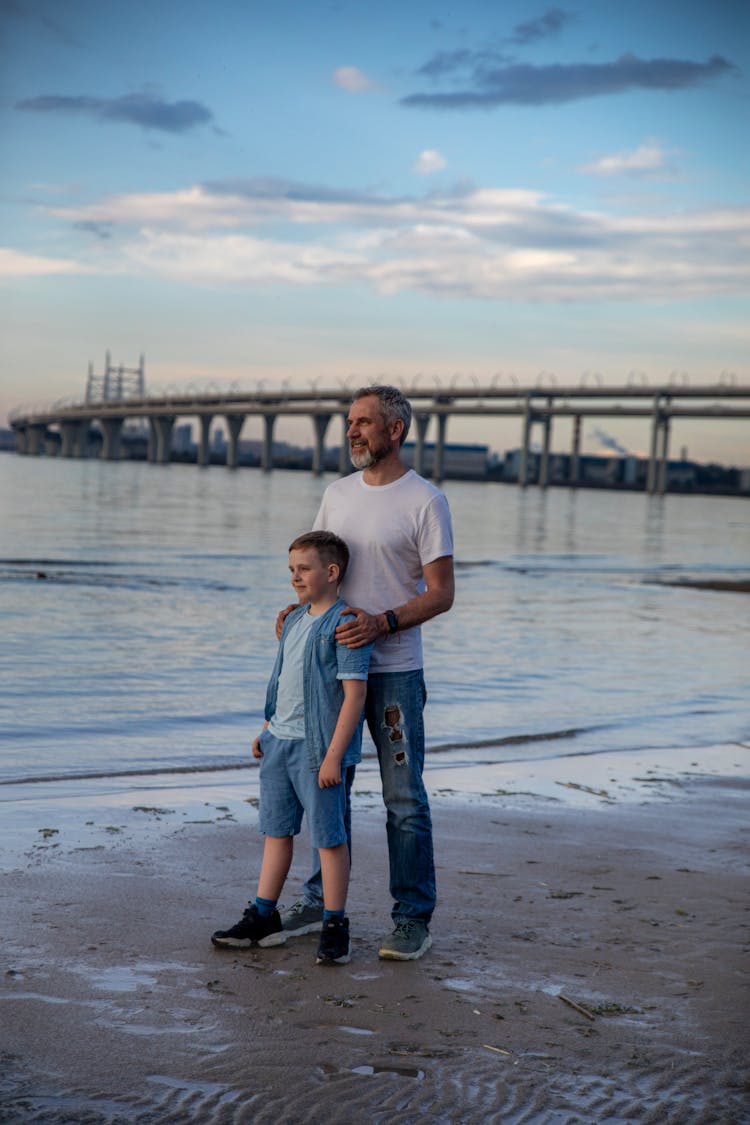 Son And Father Together On Beach