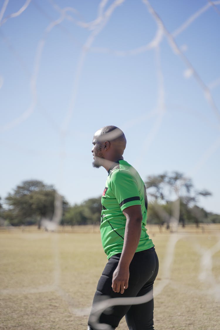 Man Behind Football Goal