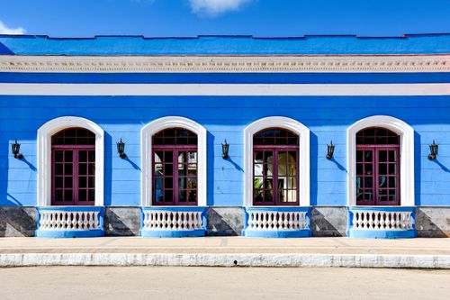 Free Sunlit colonial blue building façade in Remedios, Villa Clara, Cuba, showcasing classic architecture. Stock Photo