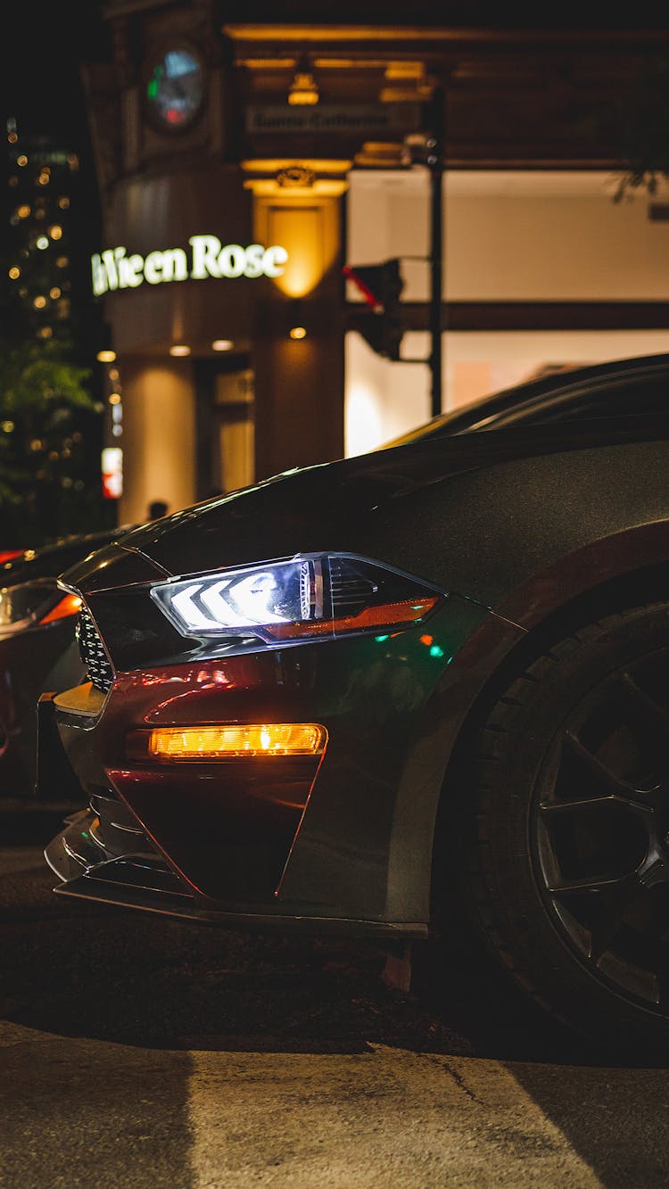 Black Ford Mustang On Street At Night