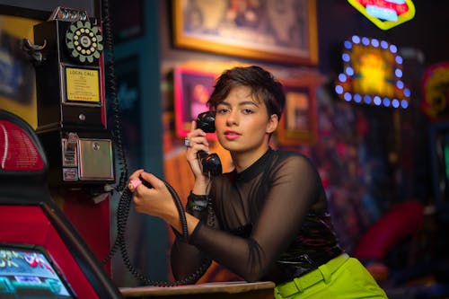 Woman Posing with Vintage Telephone