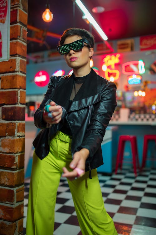 Woman in Jacket and Sunglasses