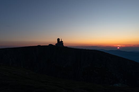A breathtaking sunset view over a mountain silhouette in Szklarska Poręba, Poland.