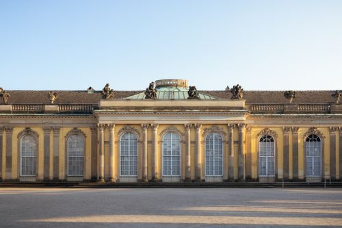 Free Front view of the historic Sanssouci Palace in Potsdam, highlighting its elegant architecture. Stock Photo