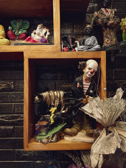 Antique Figurines on Shelves 