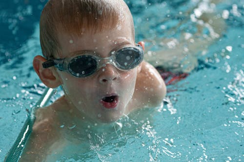 Boy Swimming in Goggles