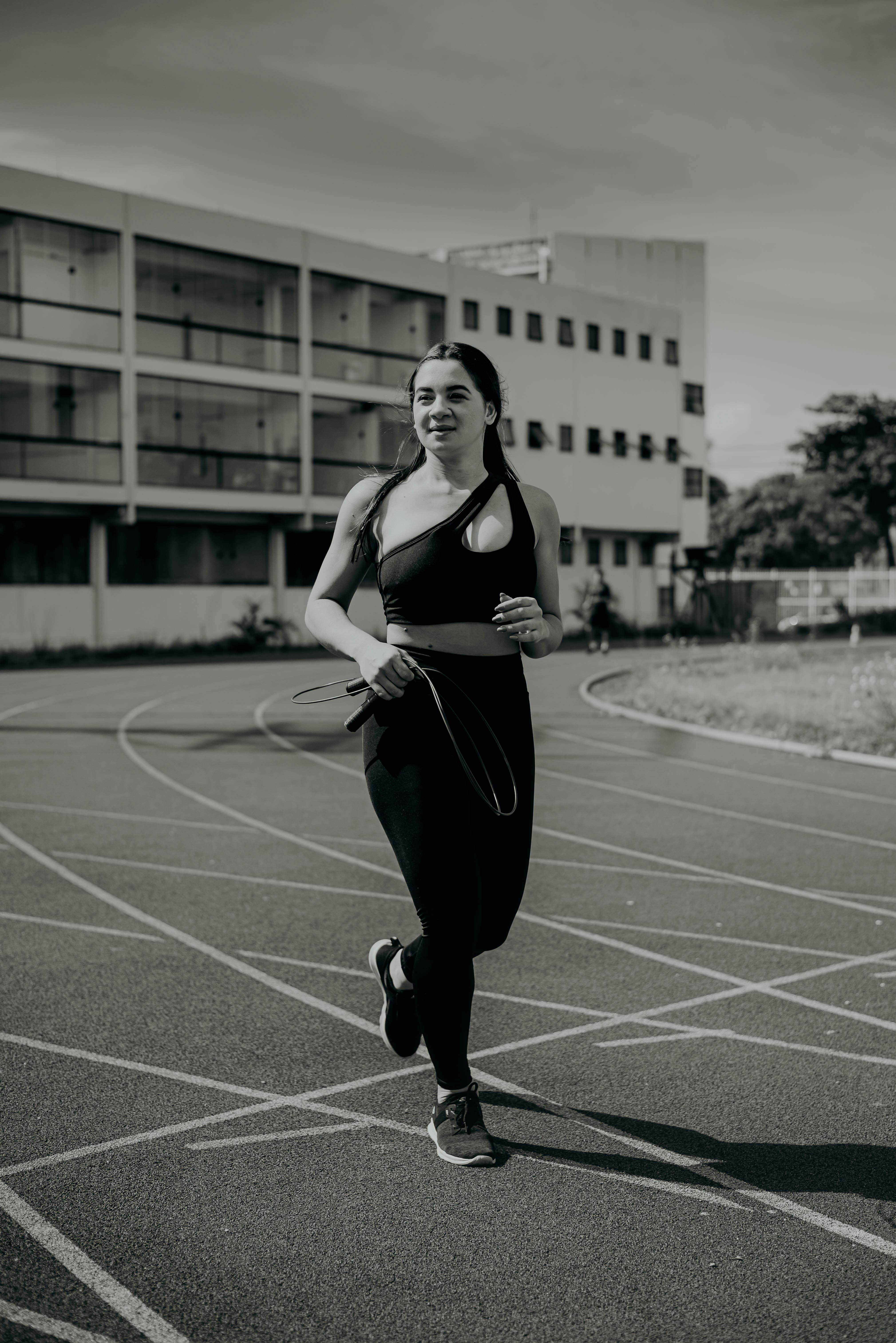 Concentrated Confident Female in Sportive Outfit Jogging in Urban Area at  Spring Day Stock Photo - Image of jogger, athlete: 227832070
