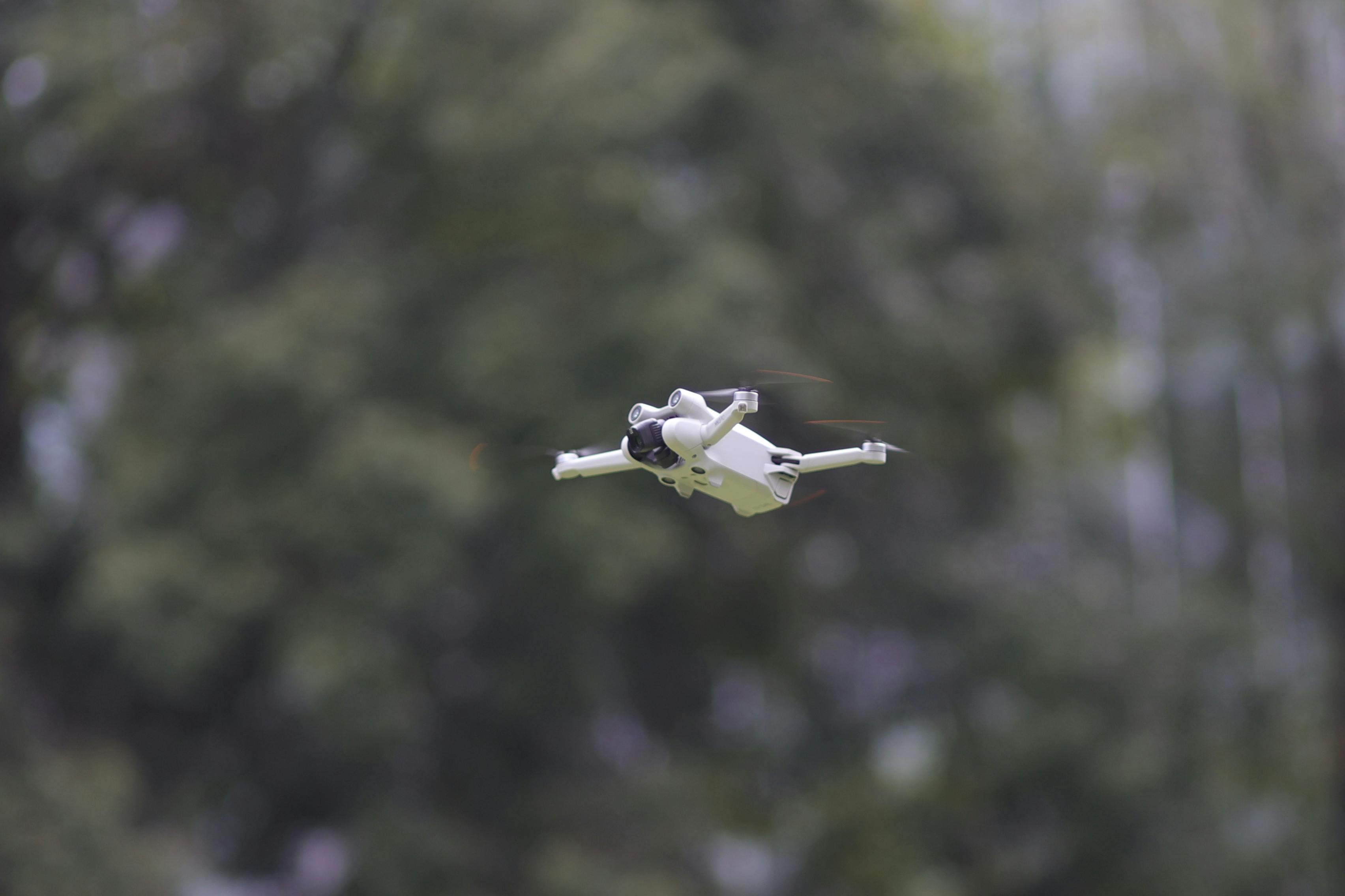 white drone in flight