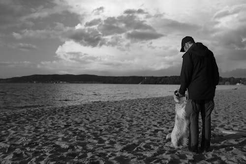 Man with Dog on Beach