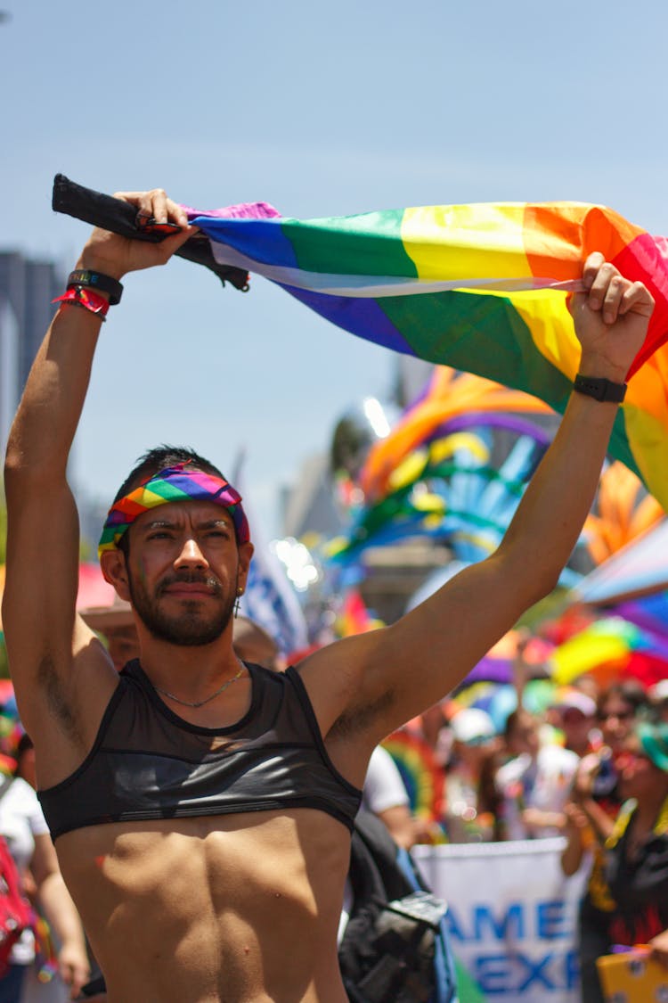 Man Posing With Rainbow Flag