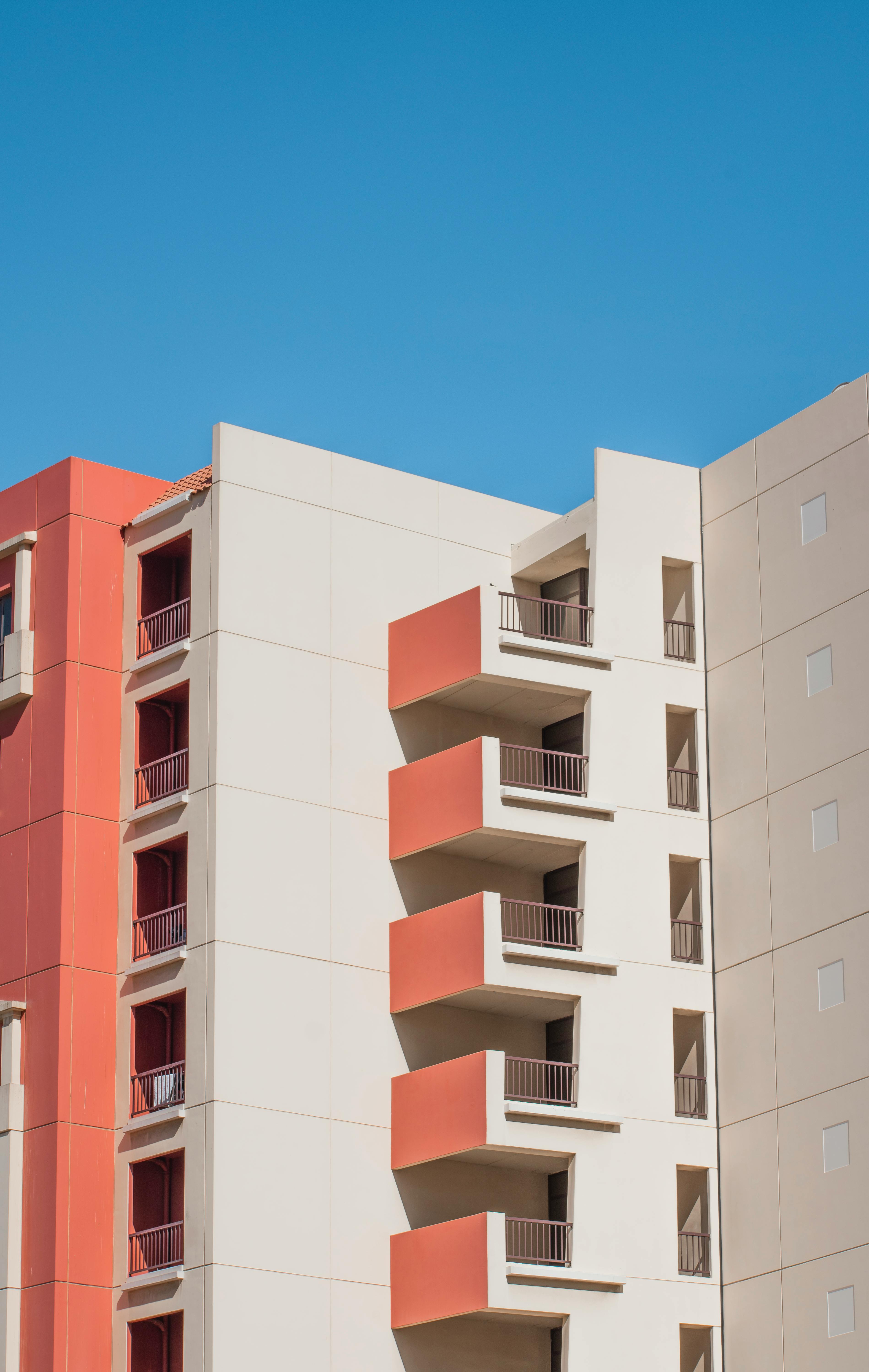 A newly built modern infill housing project in a busy city neighborhood.