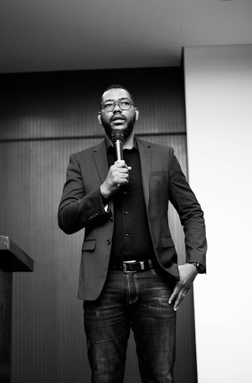 Elegant Man with Microphone in Hand