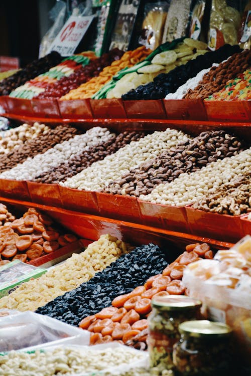 Close-up of Containers with Dried Fruits at a Market 