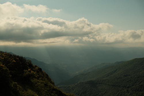 View of Mountains and the Valley from a Mountain Peak 