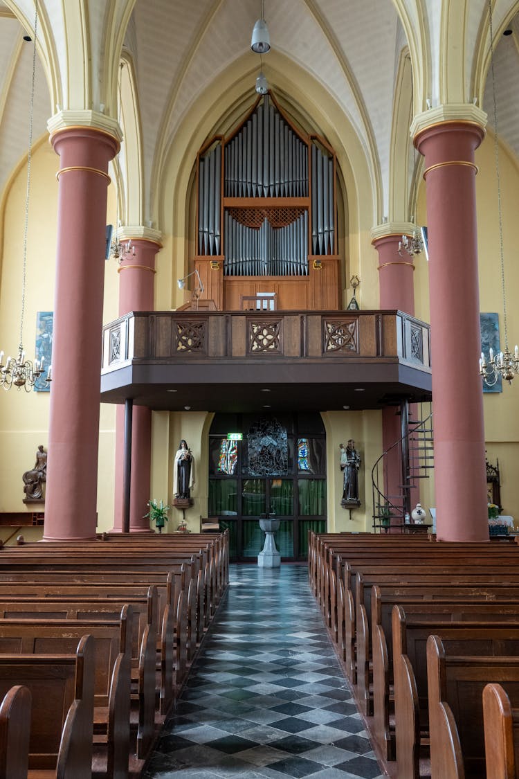 View Of The Aisle And Entrance To The Church