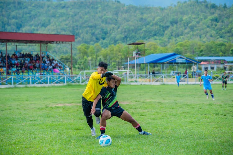 Men Playing Football