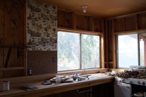 A kitchen with a stove and a sink