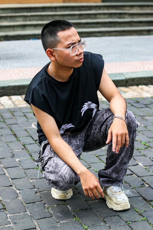 Stylish Young Man Posing on Street