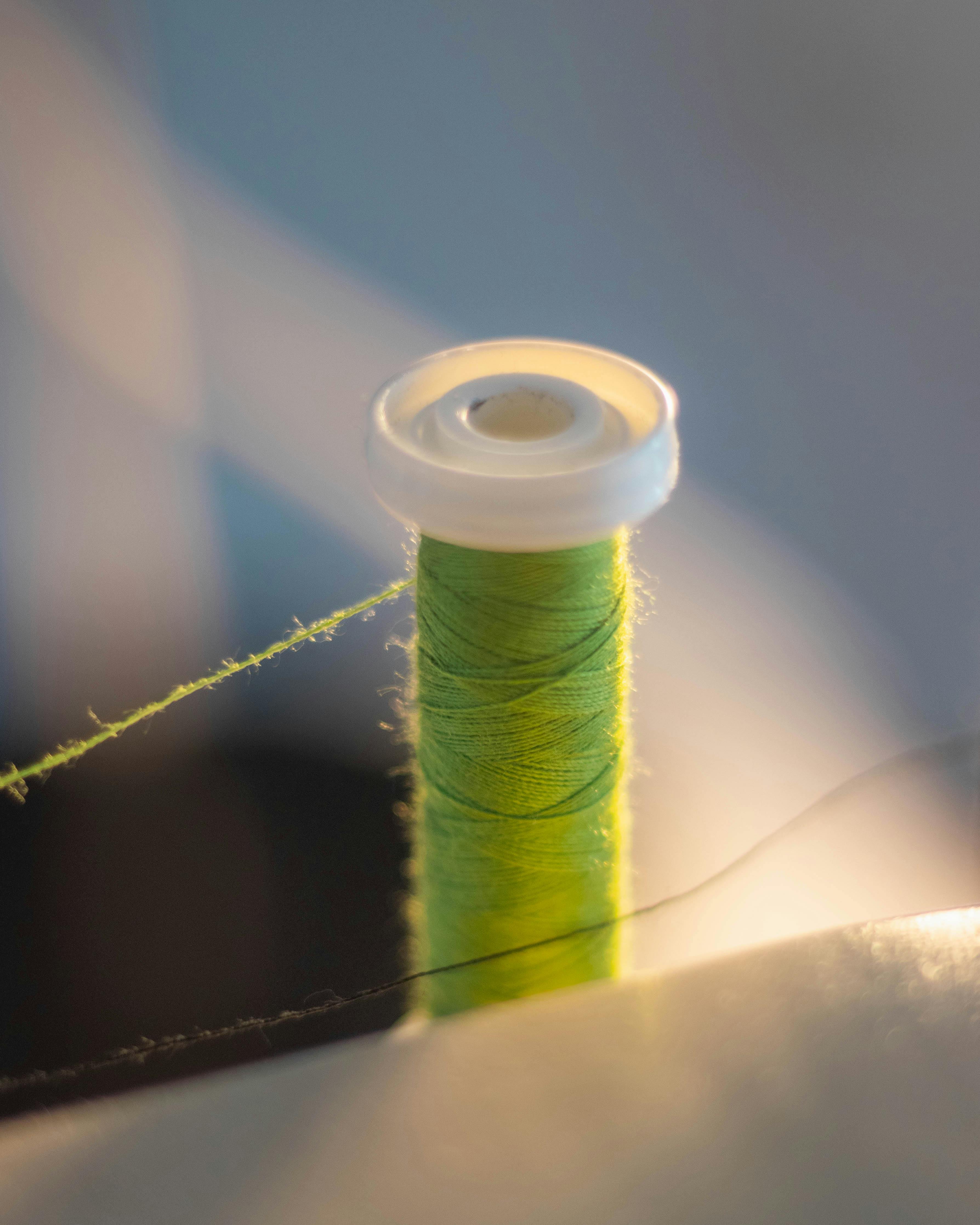 closeup to lime green sewing thread · Free Stock Photo