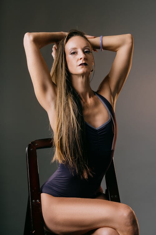 Blonde Woman Posing on Chair